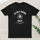 Be Like A Proton: Positive Even When Surrounded By Negatives. T-Shirt